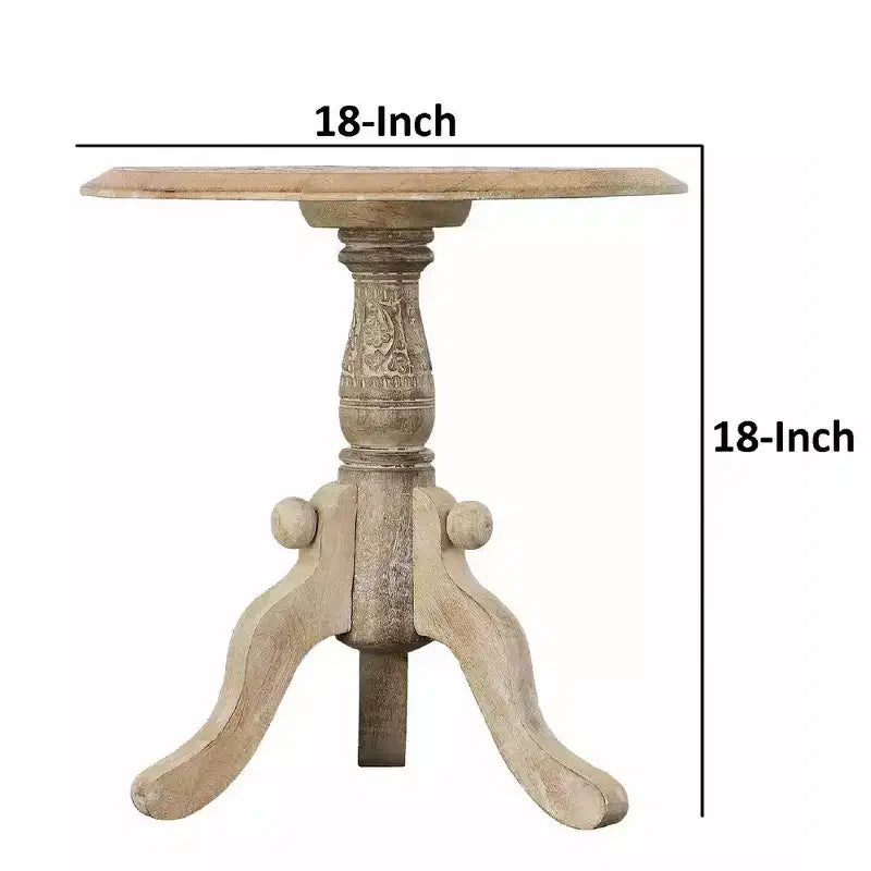 Table d'appoint en bois de manguier finement sculpté avec plateau rond et piétement piédestal